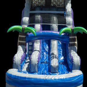18ft Tsunami Boulder Waterslide a dual lane slide with bright blue purple and grey colors. Also has palm trees.